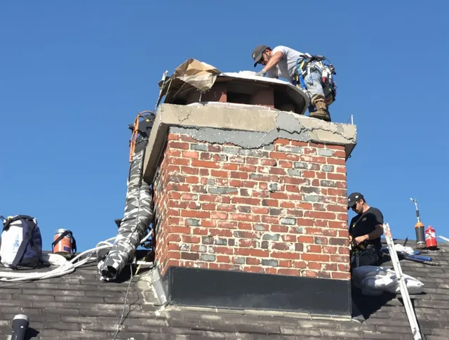 Coventry Chimney Sweep installing a custom chimney crown in Coventry, CT