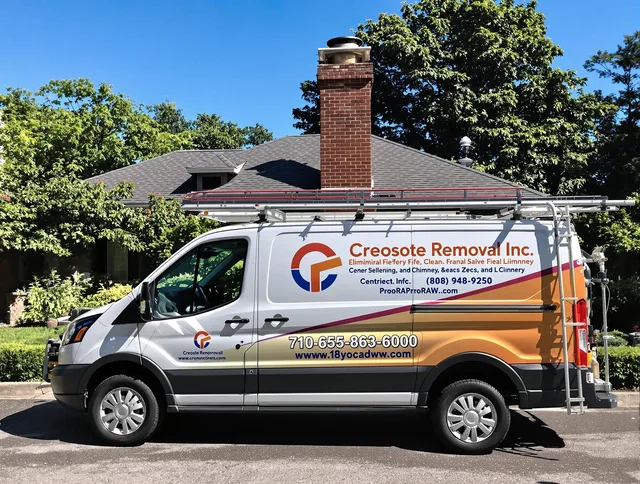 Coventry Chimney Sweep technician removing creosote safely in Coventry, CT
